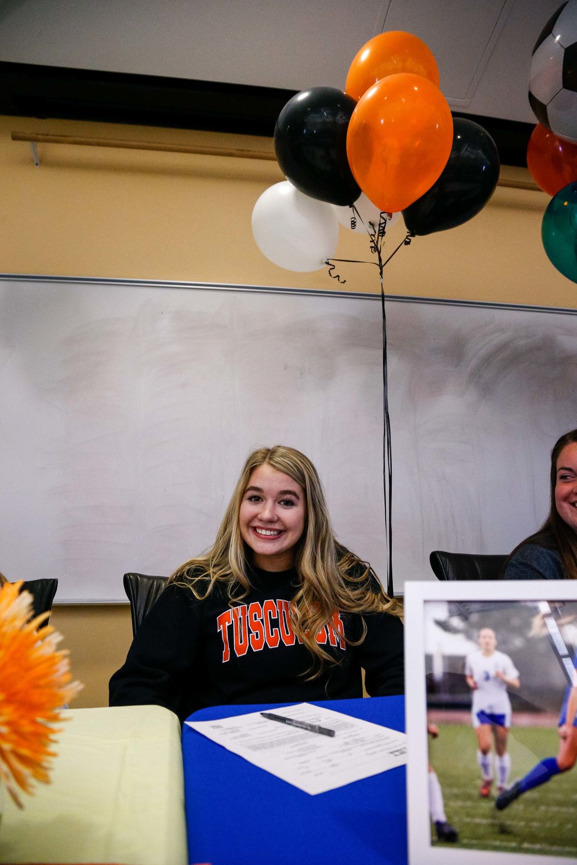 SIGNING DAY: Rampart athletes sign their National Letter of Intent